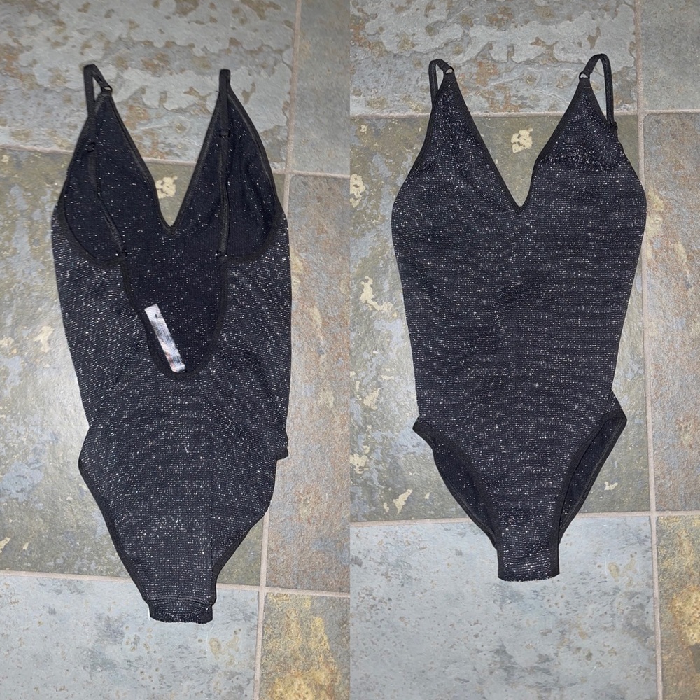 Urban outfitters black sparkly bodysuit size XS.